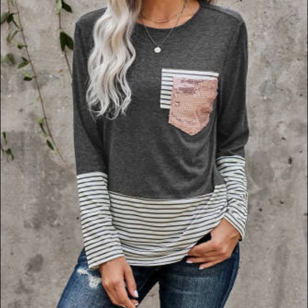Trendy Top with sequin pocket